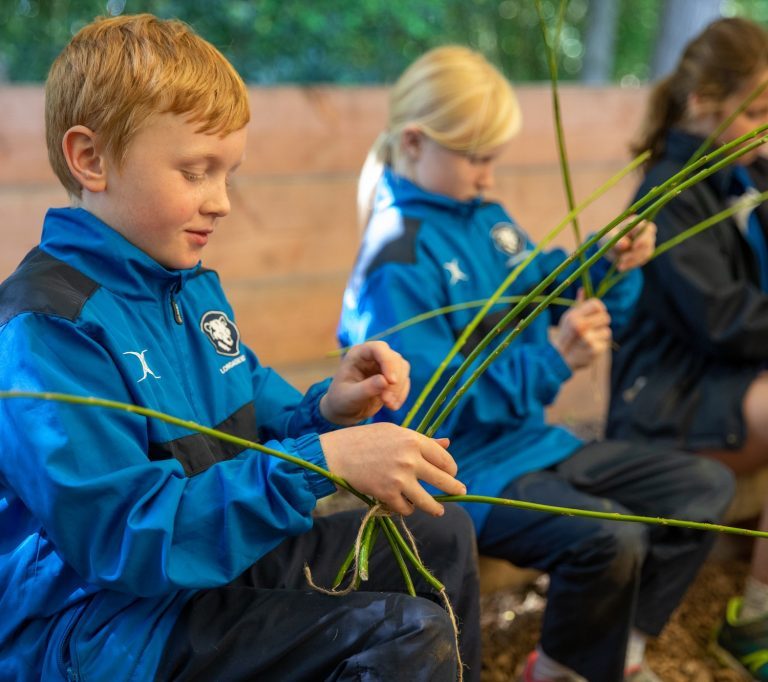 student wrapping stems