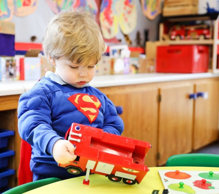 child playing with a toy