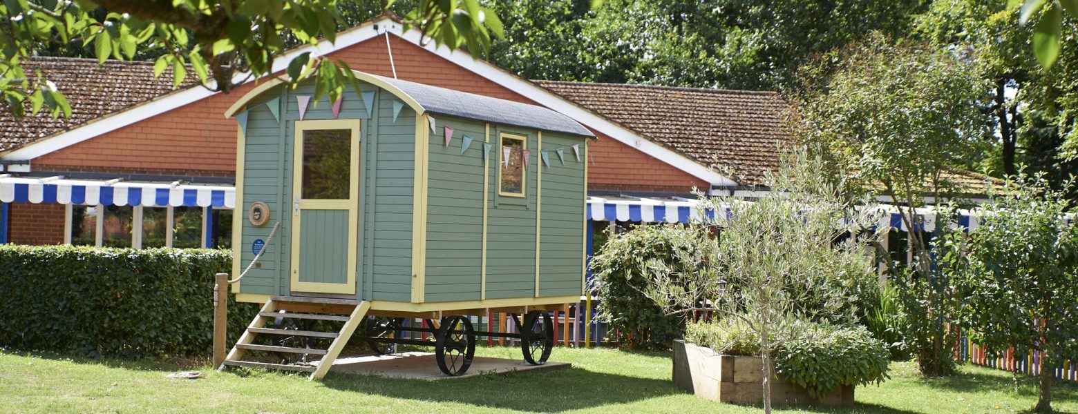 Small gypsy caravan on the grass