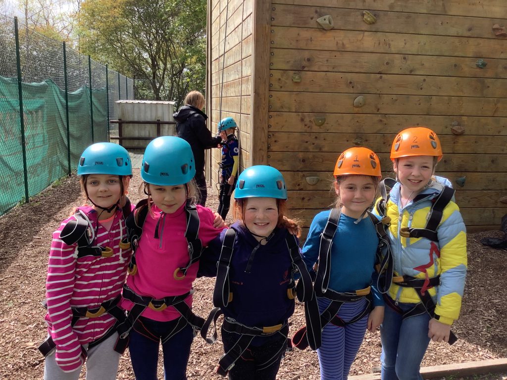 5 girls in safety gear