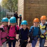 5 girls in safety gear