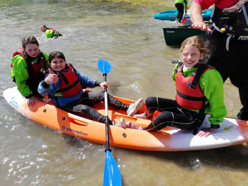 girls in a canoe