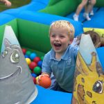 boy in a ball pit