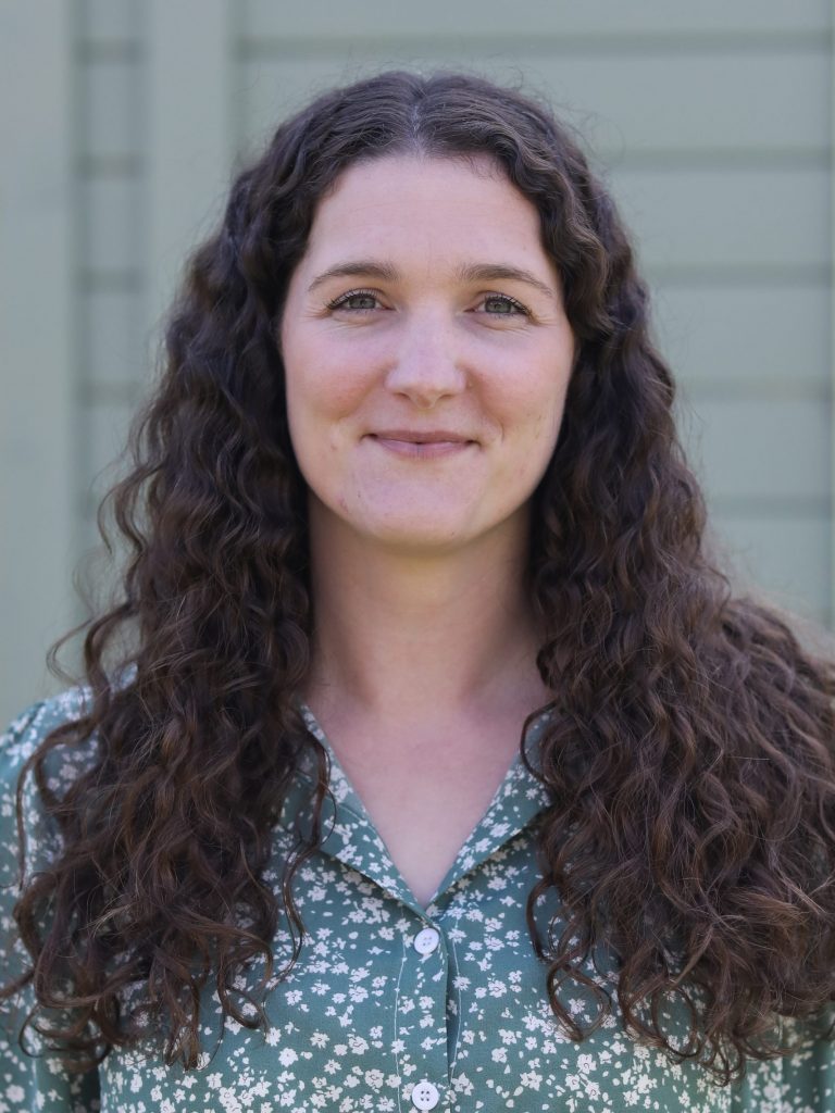 Lady with brown curly hair