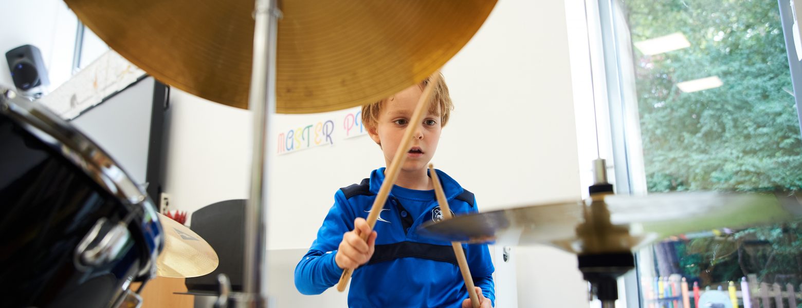 boy playing the drums