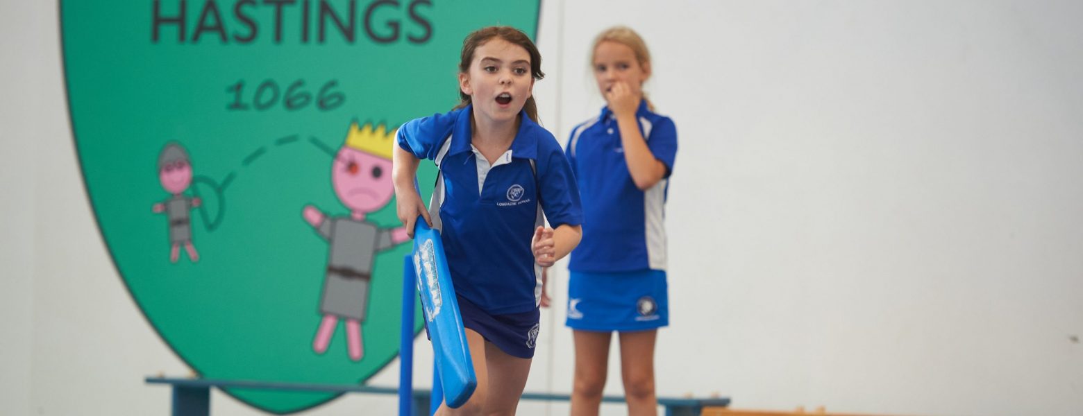girls playing indoor cricket