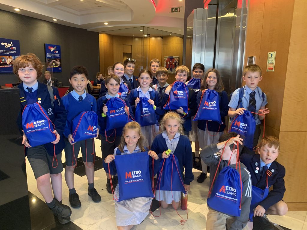 students with their metro bank backpacks