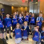 students with their metro bank backpacks