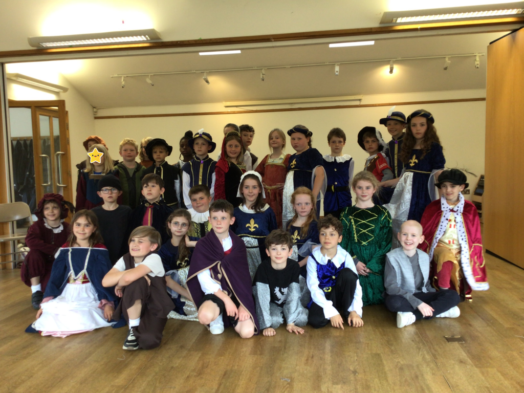 students in old English clothing