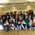 students in old English clothing