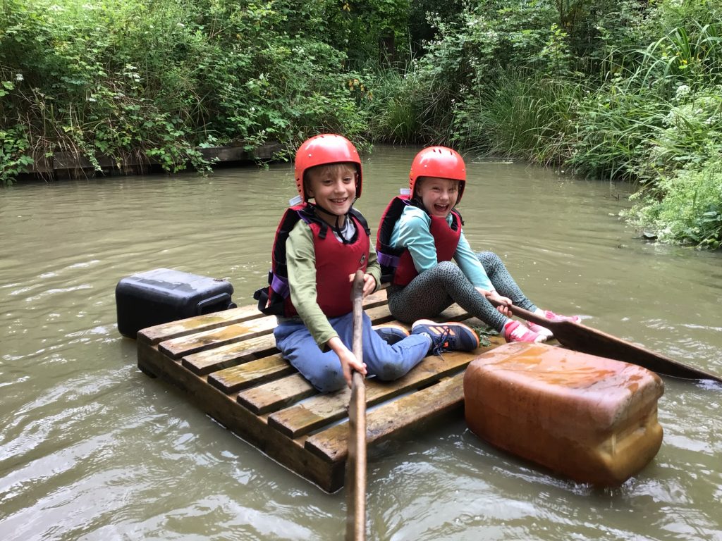 students on a barge