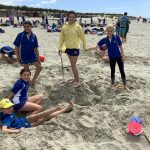 students at the beach