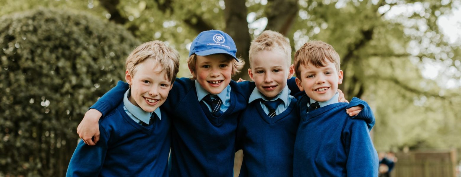 students with arms around each other