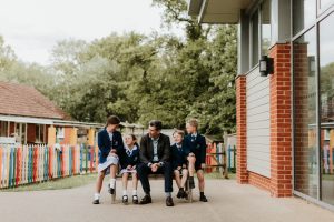 students sat with the teacher