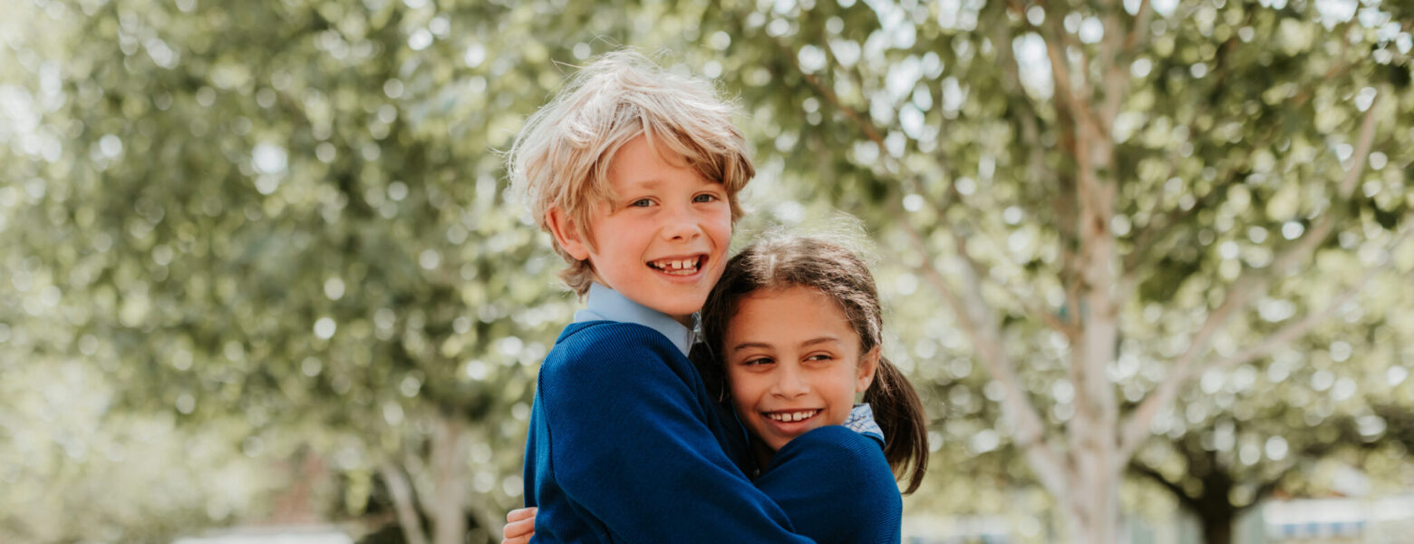 students hugging each other