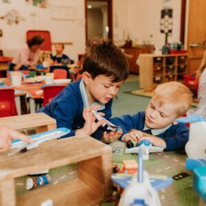 nursery boys playing with planes